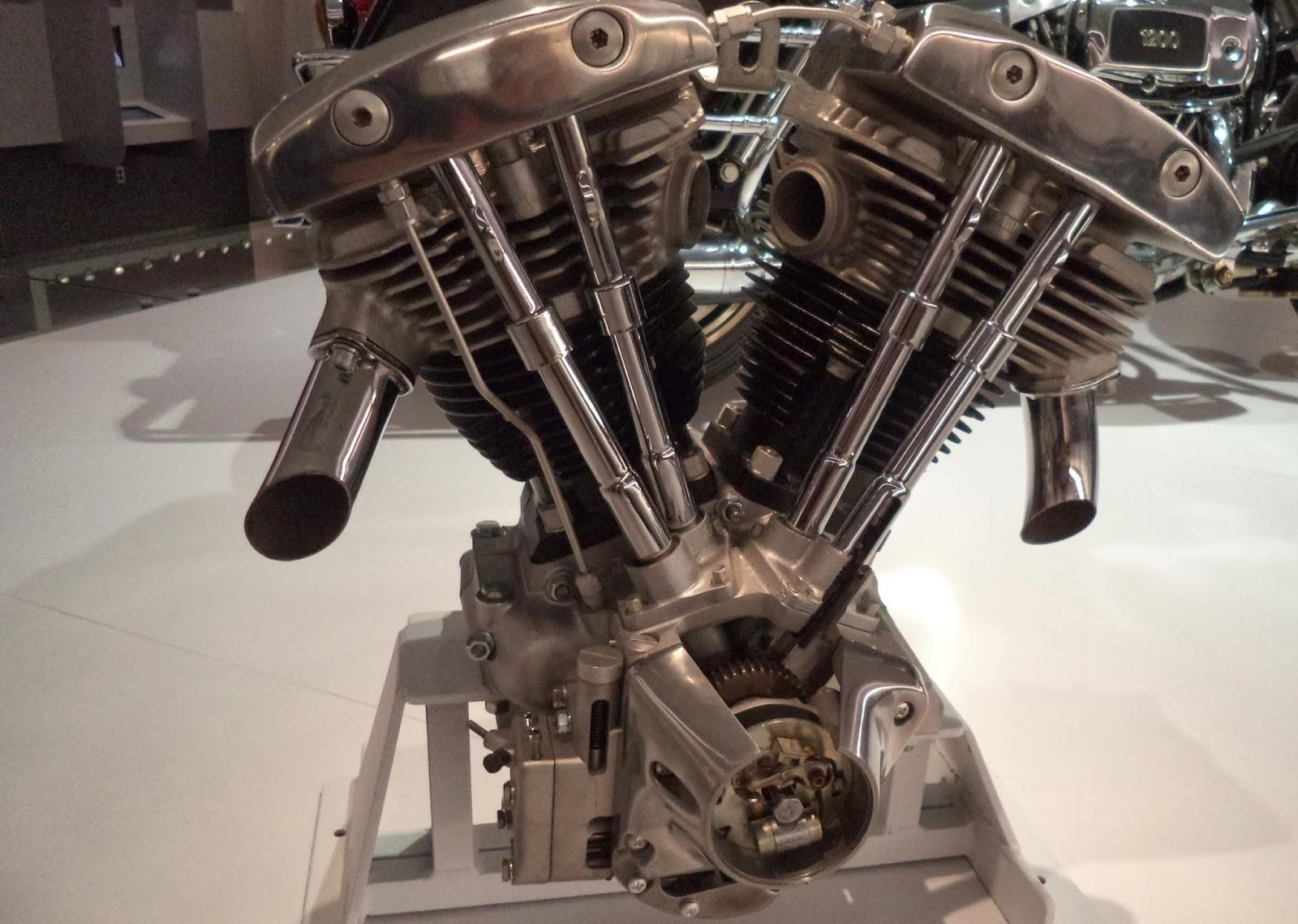 A Harley-Davidson V-twin engine displayed with internal components visible