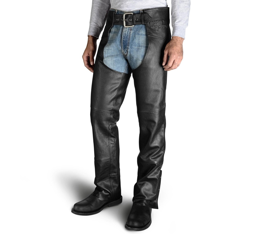 Front view: Chaps worn over jeans and secured at the waist.