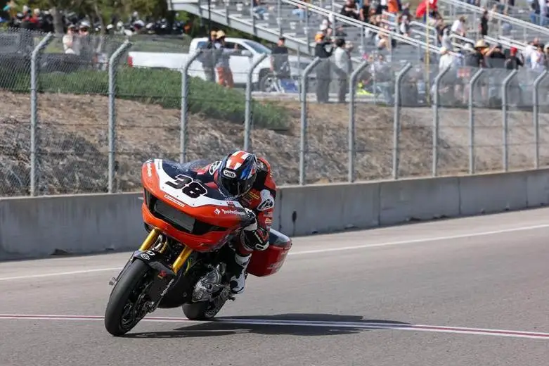 Bradley Smith racing a Harley-Davidson Road Glide at Laguna Seca.